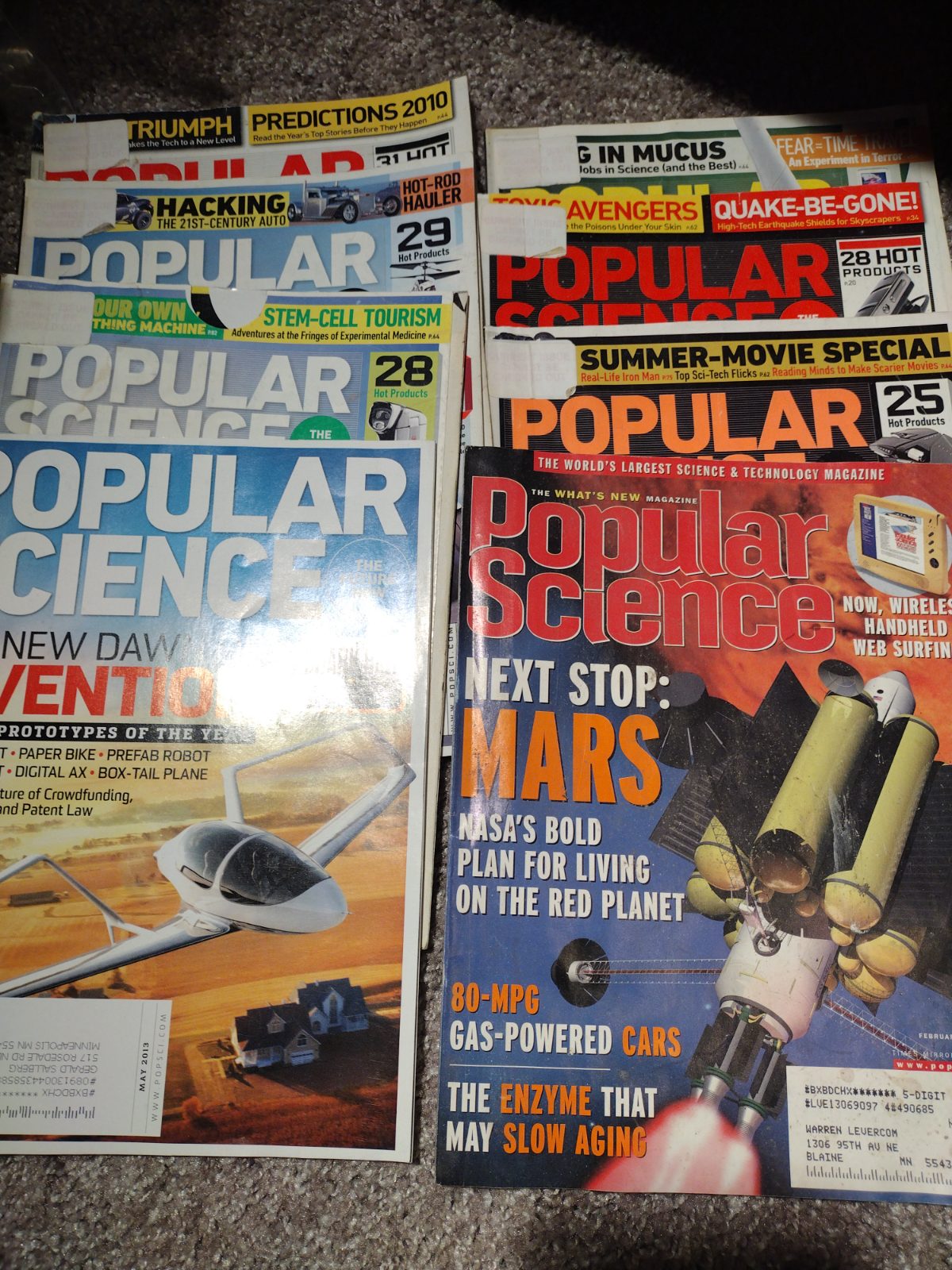 Stack of Popular Science Magazines — magazine (photo 1)