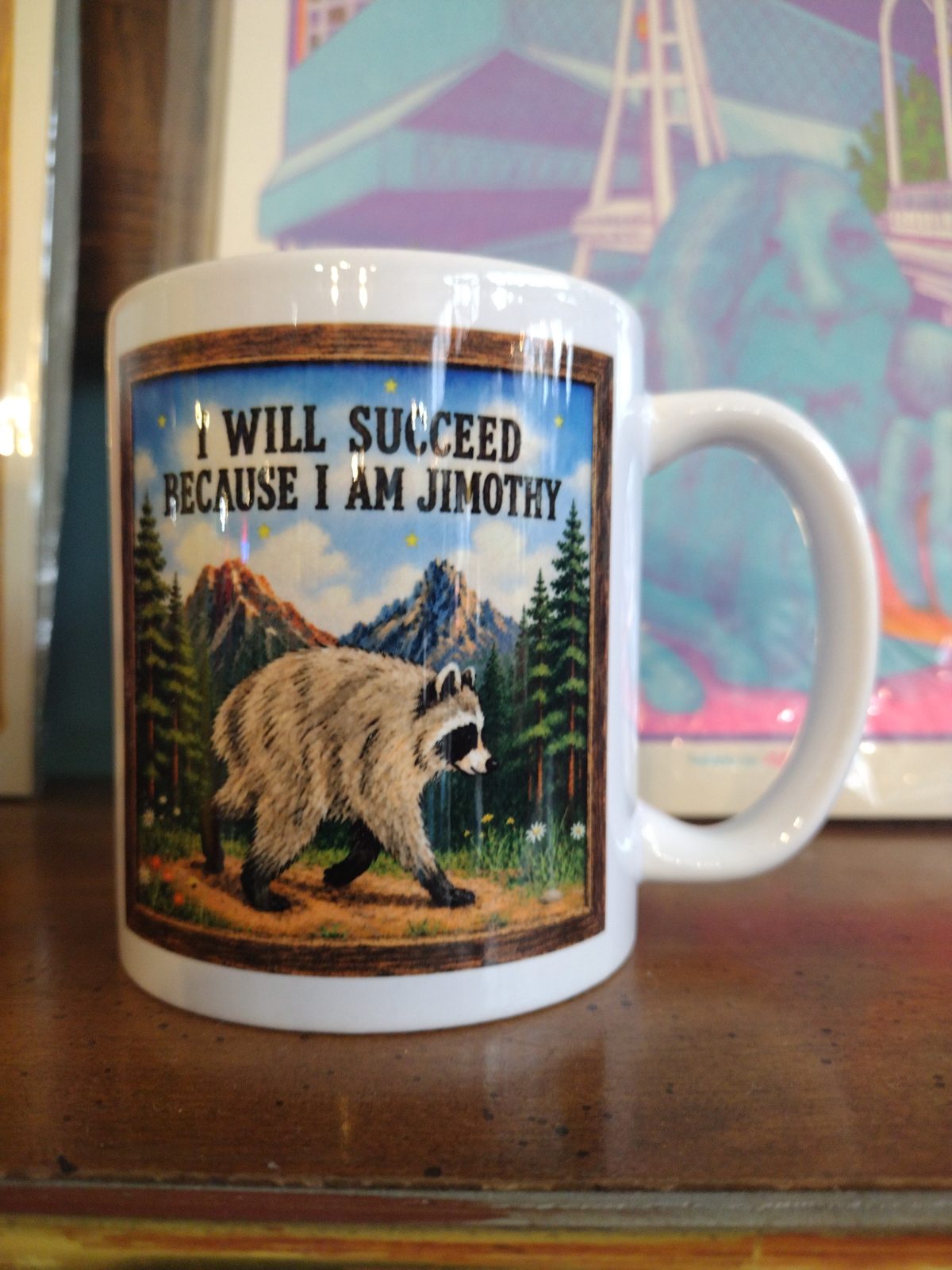 White ceramic mug with a raccoon illustration and the text 'I Will Succeed Because I Am Jimothy'.
