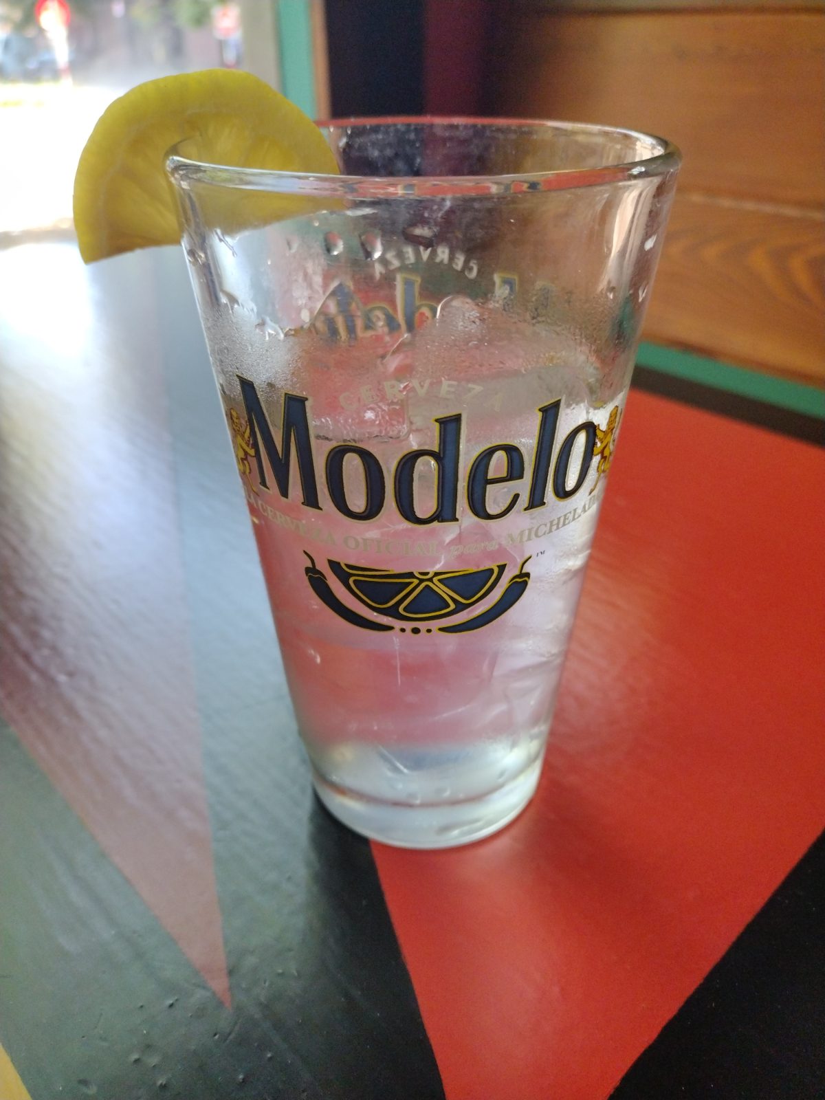 Modelo Beer Glass with Lemon Slice
